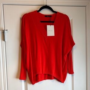 Deluc Bright Red V‑Neck Oversized Sweater